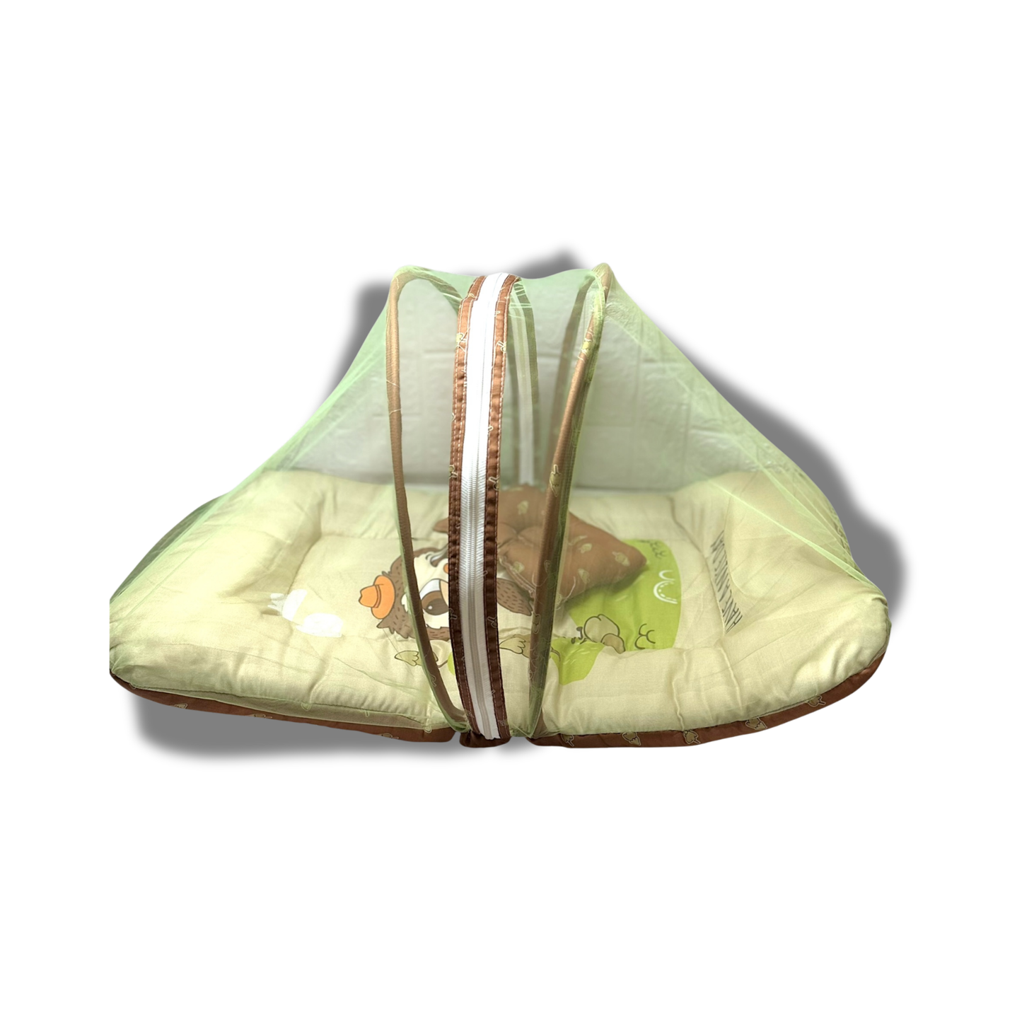 Green baby crib with cartoon design on a white background “Newborn baby sleeping peacefully in a cotton baby mosquito net bed with mattress and pillow, safe baby sleeping bed with net for newborns protection.”